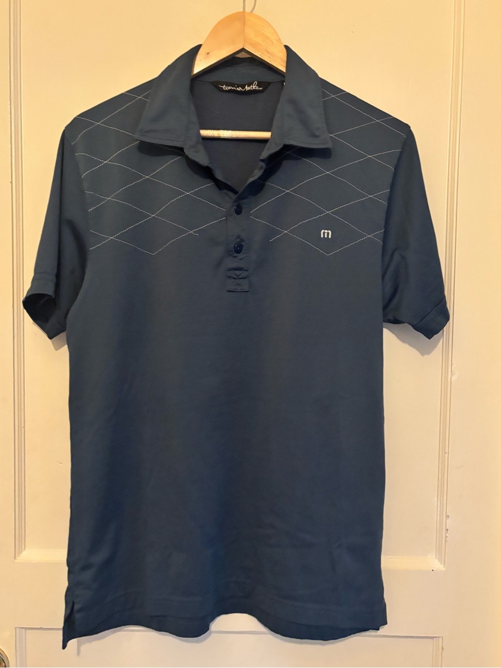Travis Mathew Slate Blue Short Sleeve Polo with Subtle Diamond Stitch